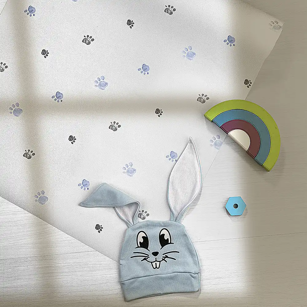 کاغذ دیواری کودک طرح ردپای سگ | آبی کد 12114 11 کاغذ دیواری کودک طرح ردپای سگ | آبی کد 12114 کلاه خرگوشی