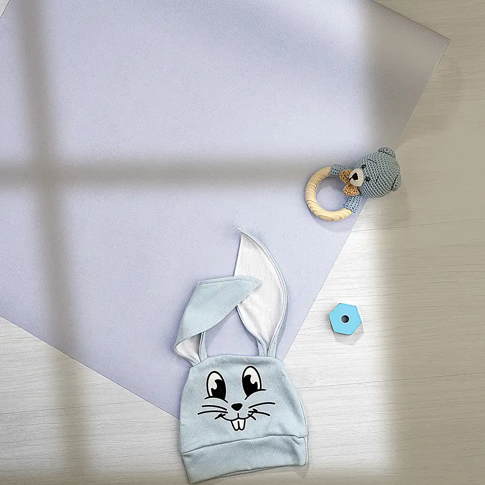 کاغذ دیواری کودک طرح ساده | آبی کد 12115 11 کاغذ دیواری کودک طرح ساده | آبی کد 12115 کلاه خرگوشی